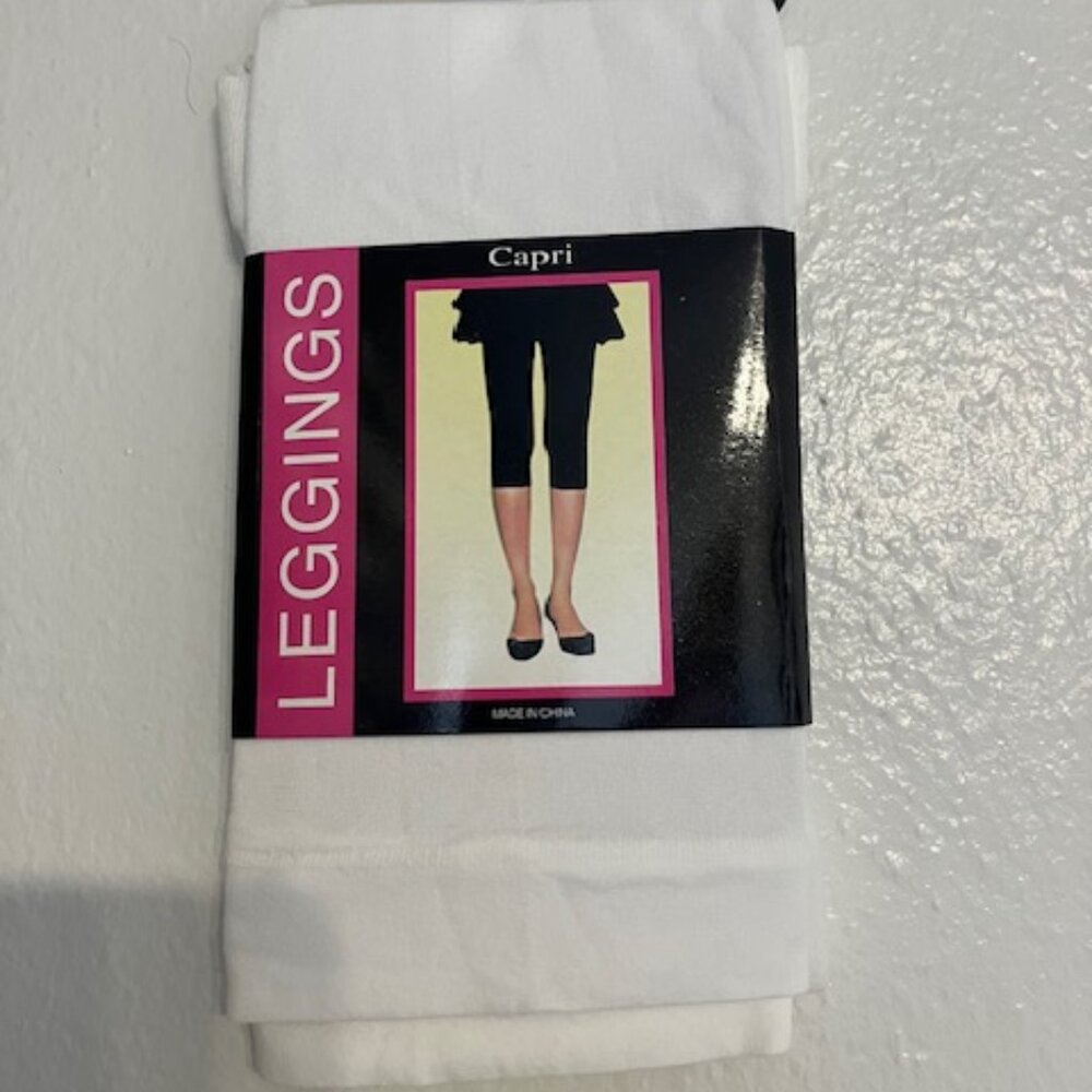 Sheer white capri-style legging hosiery, fits multiple sizes, new in package.